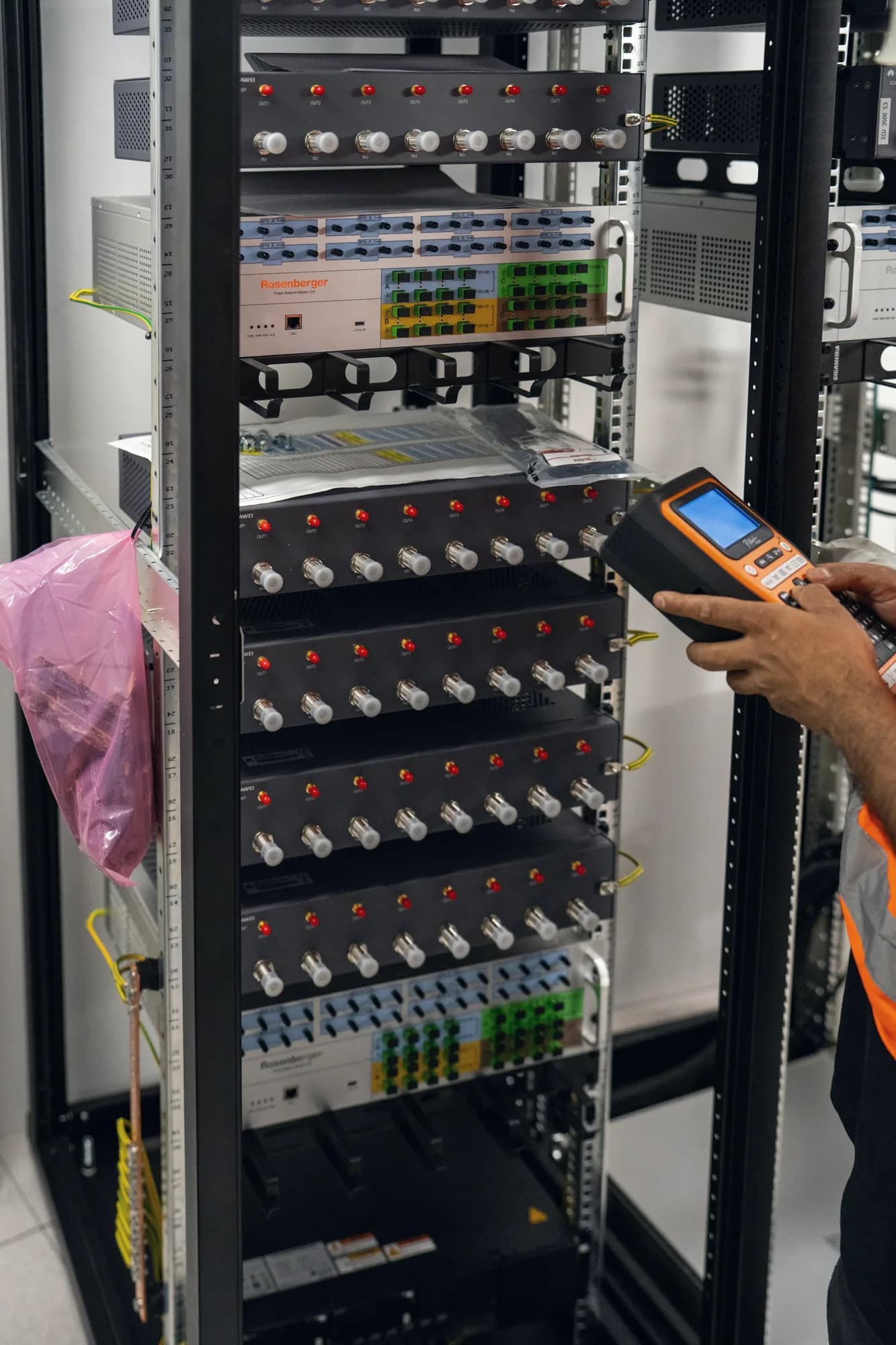 Technician testing rack equipment